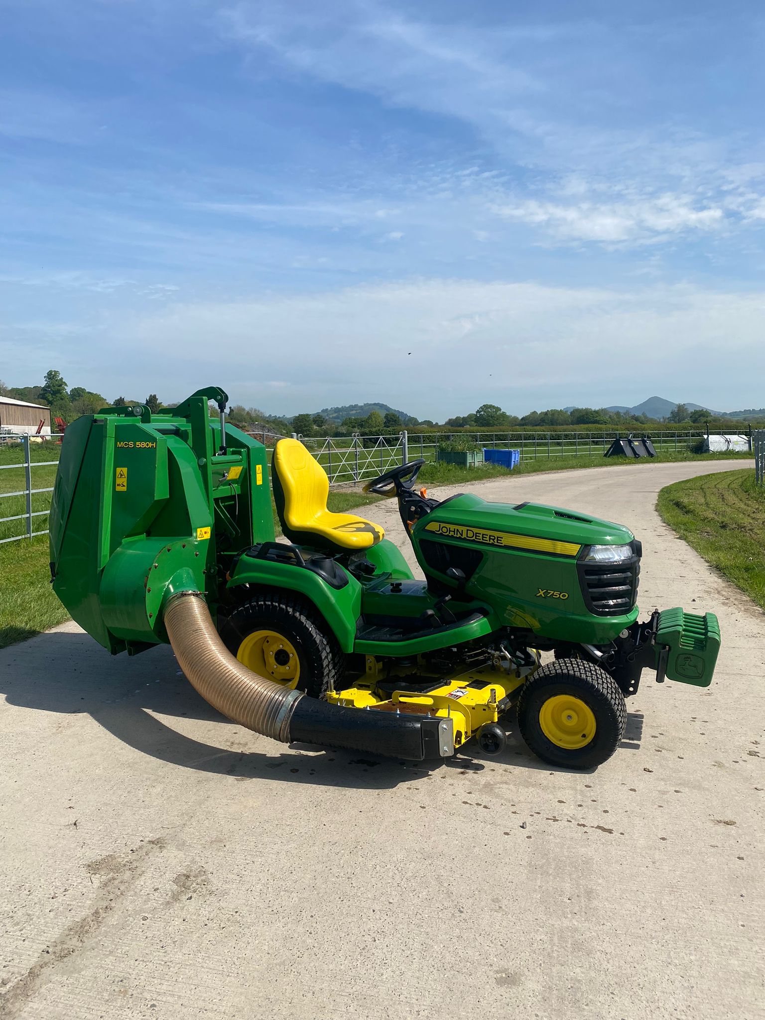 John Deere X750 with MCS 580 High Tip Collector